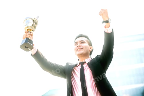 Preview: Businessman Wins A Trophy. Top Salesperson Concept