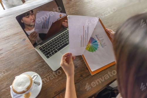 Preview: Businesswoman Reading Reports About The Number Of Sales