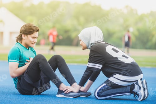 Preview: Athletic Man and Woman Training Outdoors Together