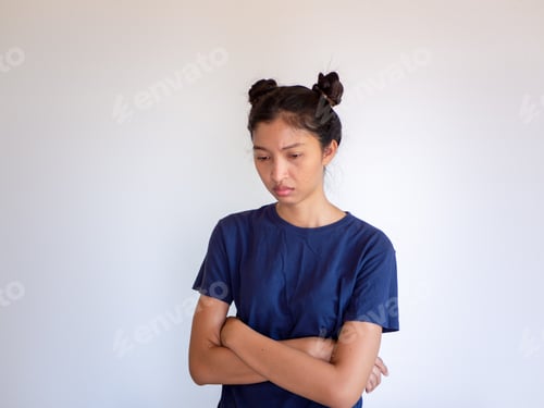 Preview: Unhappy And Annoyed Face Of Asian Woman Standing