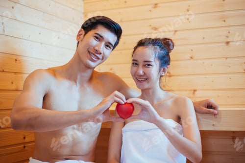 Preview: Young Couple Relaxing And Enjoying The Sauna Together At The Spa. Romantic Lovers And Body Care