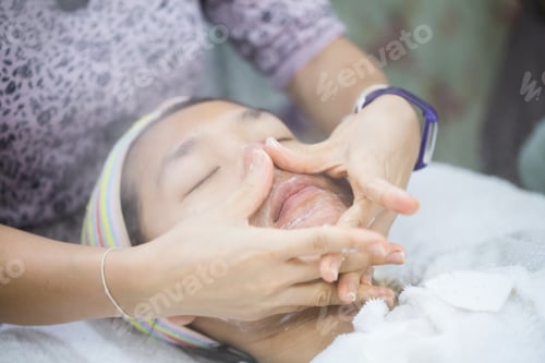 Preview: Young Woman Getting Spa Face Massage With Hot Stream. Facial Beauty Treatment In Spa Salon.
