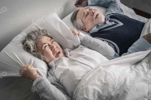 Preview: Elderly Couple Caucasian Senior Woman And Man Sleep On Bed And Snoring In White Blanket In Bedroom