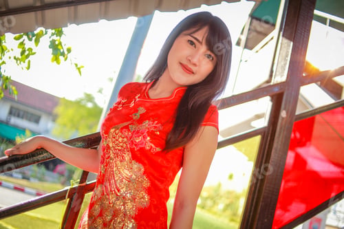 Preview: The Beautiful Lady In Chinese Dress. Happy Chinese New Year Concept.