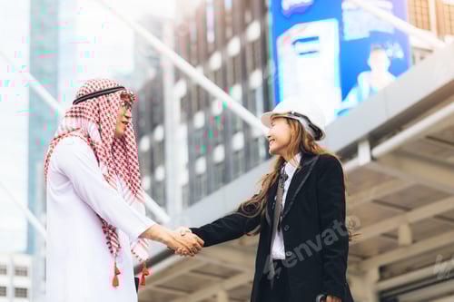 Preview: Business Success Concept. Asian Muslim Businessman And Engineer Woman Making Handshake Or Holding