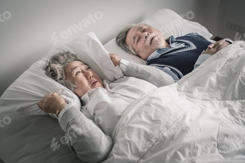 Preview: Elderly Couple Caucasian Senior Woman And Man Sleep On Bed And Snoring In White Blanket In Bedroom