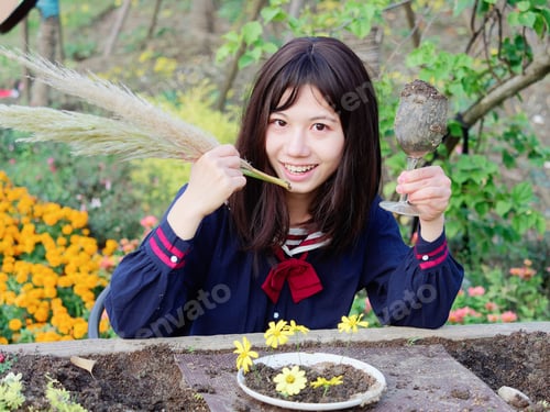 Preview: Outdoor Portrait Of Beautiful Young Chinese Girl In Blue School Uniform Japanese Style Sitting In