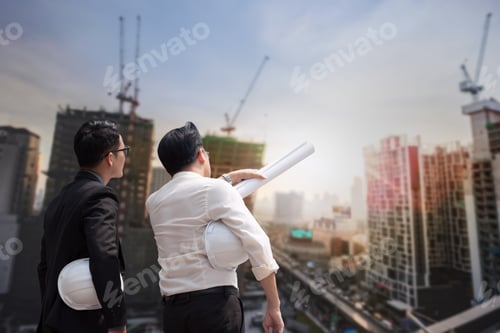 Preview: Asian Businessman Discuss With Engineer Architect In Suite, Looking And Point To Finger Forward