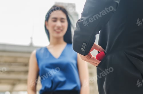 Preview: Romantic Concept With Businessman Happy Holding Ring Making Marriage Proposal Surprised With Women
