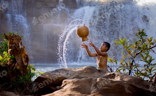 Preview: Lifestyle Of Asian Boy In The Field Countryside Of Thailand.Children Enjoy Playing Splash The Water