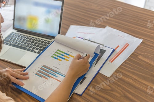 Preview: Woman Hand Writing Notes Into Document