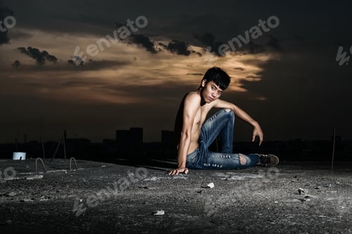 Preview: A Pensive Man Sitting Alone In The Abandoned Building