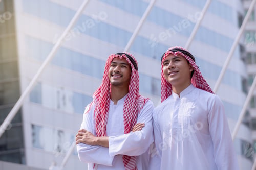 Preview: Confident Group Of Arabian Businessman Standing And Looking At City Background For Vision Concept