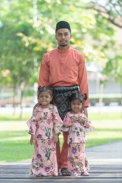 Preview: Father And Daughters - Muslim Malaysian Man And Kids Dressed Up In Eid Dress. Outdoor Portrait