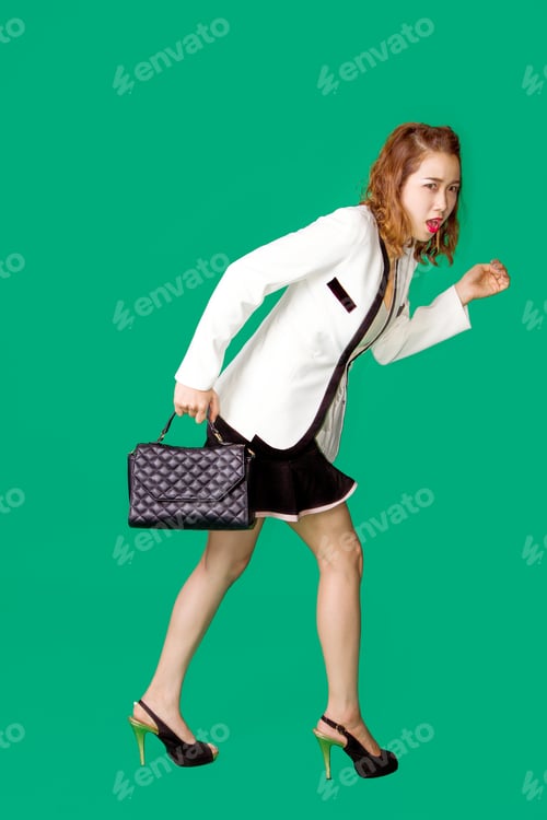 Preview: Hurry Up Walking Business Woman On Green Screen