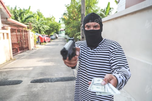 Preview: Thief Stealing Money With Gun In His Hand