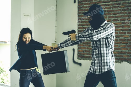 Preview: Man In Hoodie Robbing And Threatening With Gun To Frightened Young Woman. Criminal And Robbery For