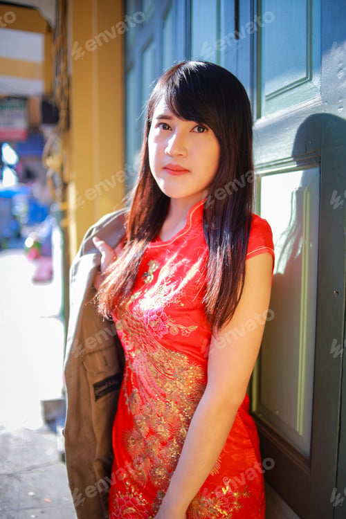 Preview: The Beautiful Lady In Chinese Dress. Happy Chinese New Year Concept.