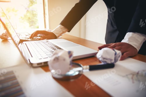 Preview: Businessman Working With Sheet Analysis Charts.