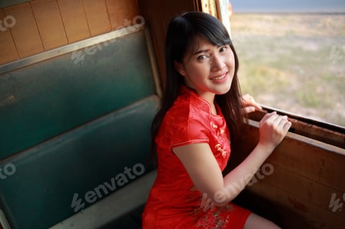 Preview: The Beautiful Lady In Chinese Dress Train Ride. Happy Chinese New Year Concept.
