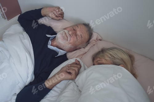 Preview: Happy Elderly Couple Caucasian Senior Man Snoring And Woman Sleeping Together In White Blanket In
