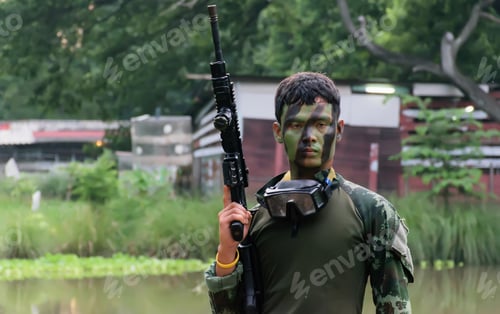Preview: Soldier With A Rifle.Army Soldier In Protective Uniform Holding Rifle .Special Forces Soldier