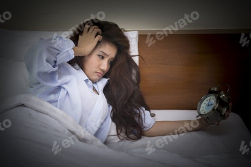 Preview: Beautiful Woman Lying On Bed Sleepless At Night. Anxiety, Stress, Disease, A Common Cause Of