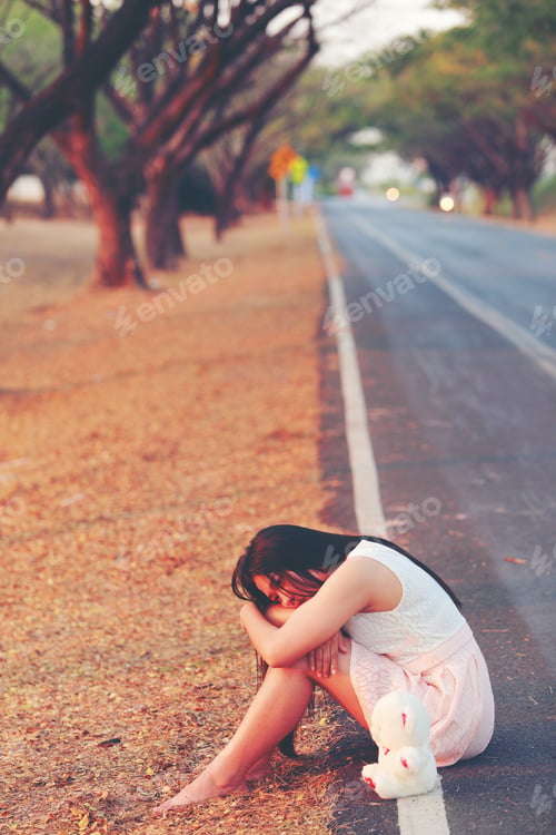 Preview: Woman And Teddy Bear Sitting On Roadside. Concept The Woman Sad. Retro Color Style.