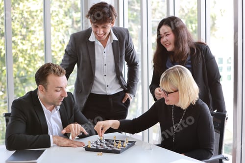 Preview: Group Of Businessman And Businesswoman Are Playing Chess, Meaning For Business Planing And Success