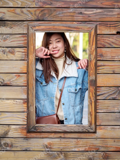 Preview: Outdoor Portrait Of Young Beautiful Fashionable Playful Chinese Lady Posing On Street With Wood