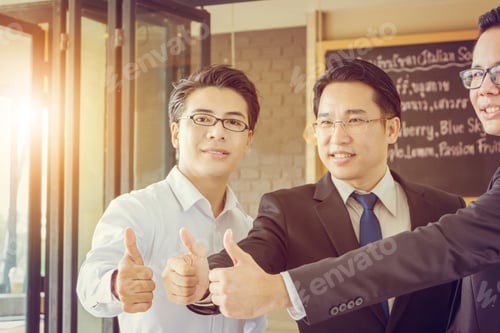 Preview: Close Up Of Business Man Team Giving Thumb Up, Success And Happiness Business Teamwork Concept.