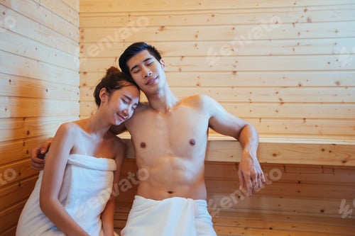 Preview: Young Couple Relaxing And Enjoying The Sauna Together At The Spa. Romantic Lovers And Body Care
