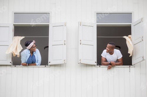 Preview: Cheerful African American Couple At Window, Happiness Family Concepts