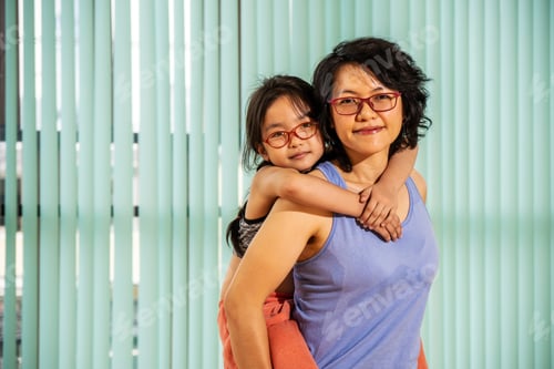 Preview: Portrait Of Gorgeous Family Mother And Daughter Having Fun And Giving Piggyback While Doing Sports