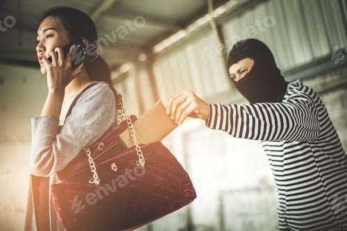Preview: Thief Stealing Wallet From Pocket Women While Her Playing Smart Phone At Side Way. Criminal And