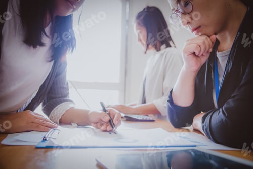 Preview: Business People Analyzing Statistics Financial Concept