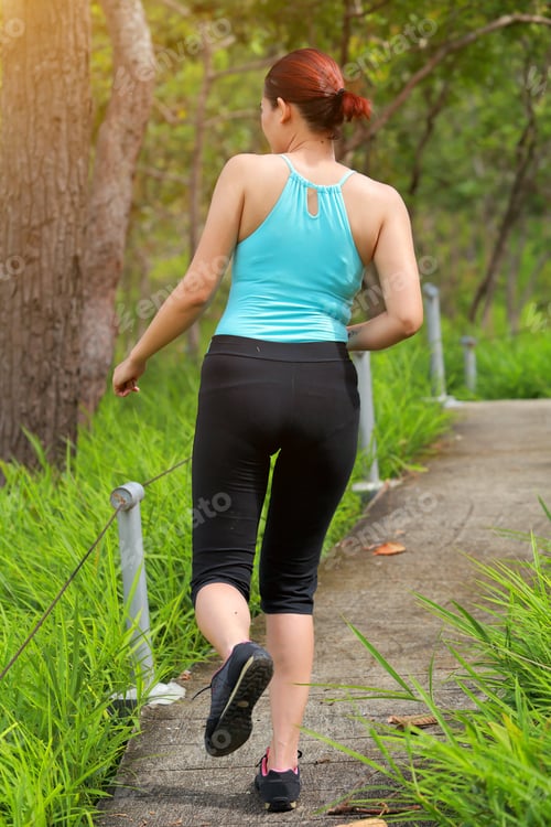 Preview: Young Woman Jogging Running Outdoors Early Morning In Park. Healthy Lifestyle Sports Fitness