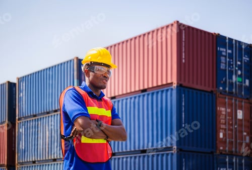 Preview: Cheerful Factory Worker Man In Hard Hat Smiling With Arms Crossed As Sign Of Success
