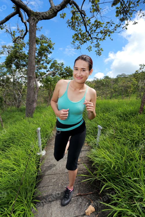 Preview: Young Woman Jogging Running Outdoors Early Morning In Park. Healthy Lifestyle Sports Fitness