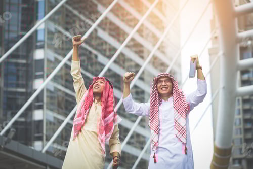 Preview: Business Winner Concept, Two Young Muslim Business Man Standing By Raising Both Hands Up In Urban