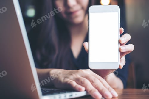 Preview: Mockup Image Of A Smiley Asian Beautiful Woman Holding And Showing White Mobile Phone With Black