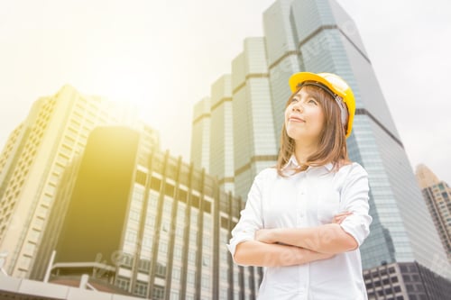 Preview: Construction And Maintenance Think Big Concept, Female Architect In Yellow Helmet With City