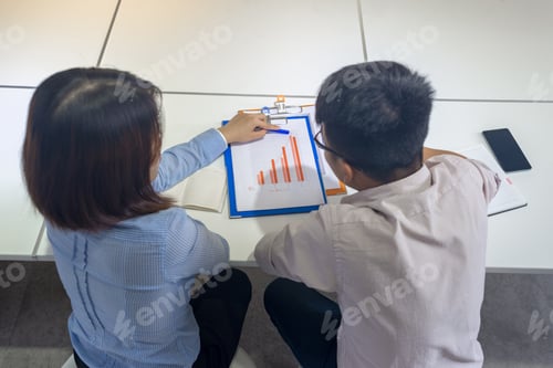 Preview: Business Team Working With Papers, View From Above