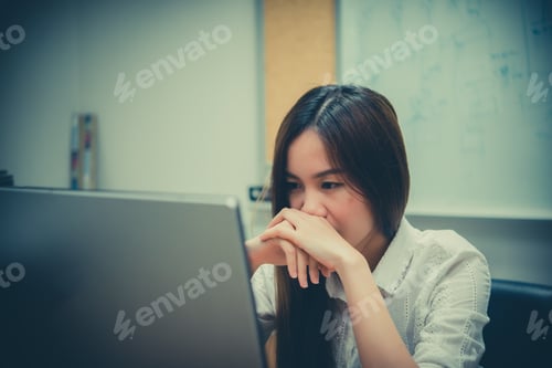 Preview: Asian Office Woman Stress From Work At The Desk With Laptop