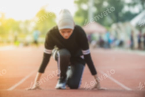 Preview: Out Of Focus / Blurred Image Concept - Muslim Sportwoman On The Starting Line
