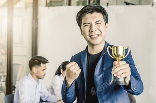 Preview: Businessman Holding Trophy Award For Success In Business, Business Team Happy Consent And