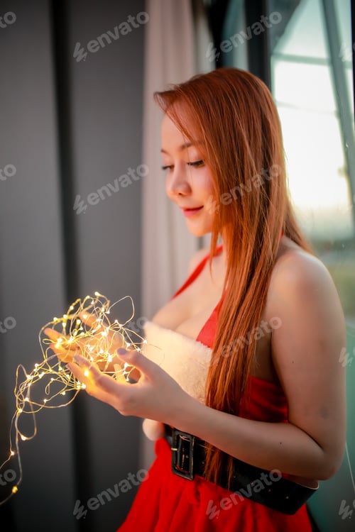 Preview: Merry Christmas And Happy New Year! Young Woman In Wear Dress Santa Claus And With Decorative