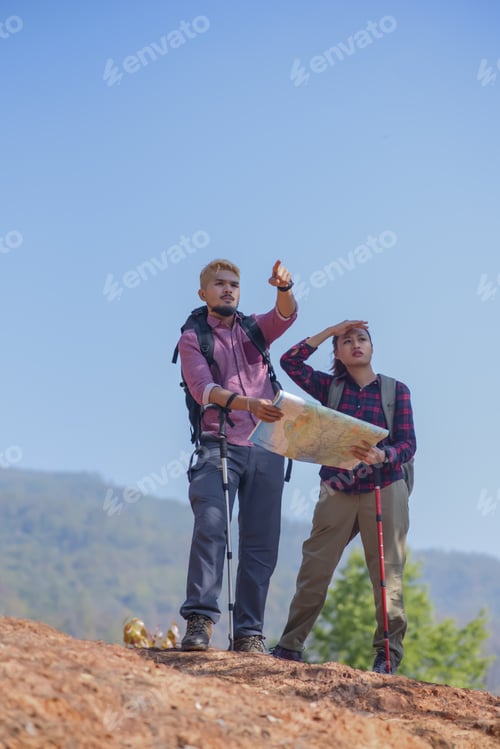 Preview: Young Attractive Couple Hiking In The Forest.