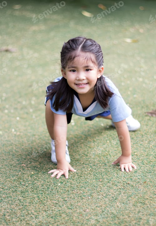Preview: Asian Running Girl In Play Park For Healthy And Grow Up