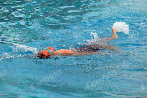 Preview: Young Man Swimmingl In A Pool